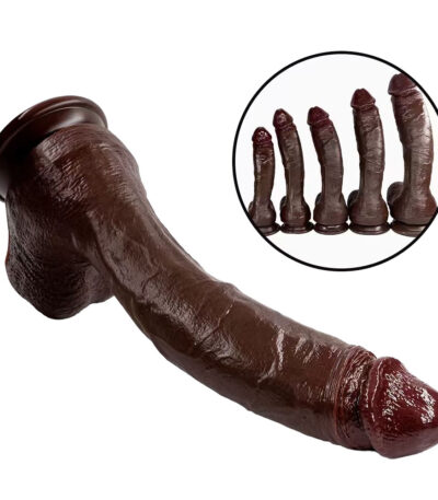 Deep black coffee-toned ultra-thick realistic silicone massager featuring explicit skin textures and a powerful suction cup base for hands-free wellness.